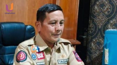 POTRET. Kepala Dinsos Sumenep, Mustangin, saat ditemui awak media di ruang kerjanya, (Dok. Istimewa/Rangkuman.net) 