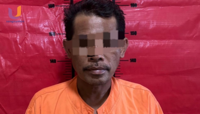 POTRET. Moh. Sahnan (51), pelaku pelecehan saat diamankan di Mapolres Sumenep. (Dok. Humas Polres Sumenep/Rangkuman.net)